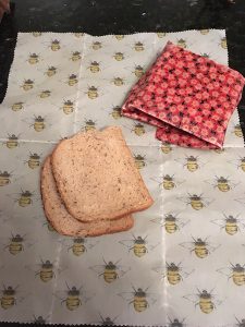 Beeswax wraps with slices of bread on them