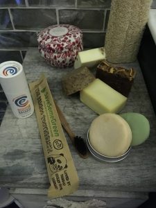 Plastic-free toiletries on a small tabletop