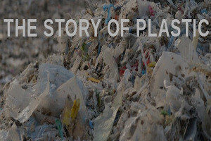 A huge pile of plastic with the caption, 'The Story of Plastic'