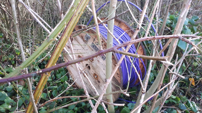 Huge cable reel dumped in woodland