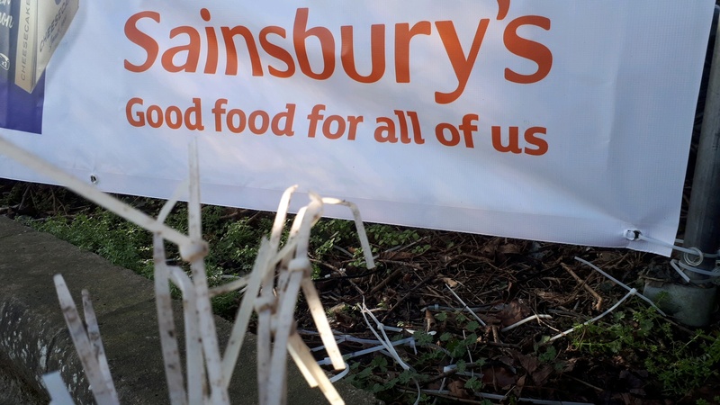 Sainsbury's sign and plastic ties