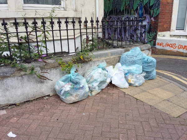Piles of rubbish left on the pavement close to Cambria Bridgeh