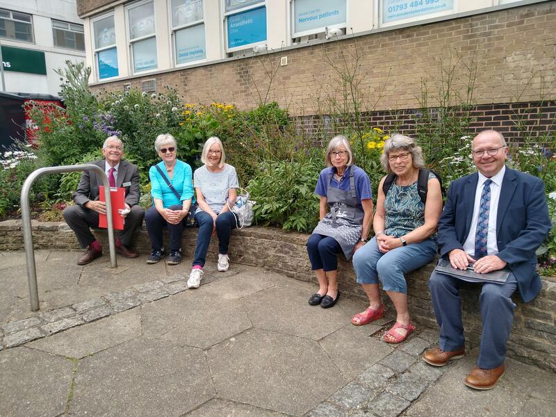 Judges, parish council staff and Old Town Residents Association gardeners on Victoria Road