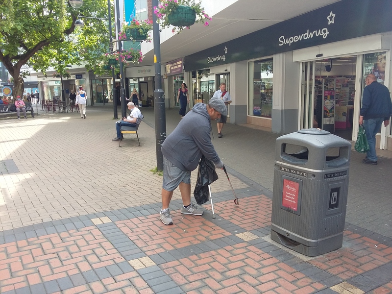 Abdul litter picking in the town centre