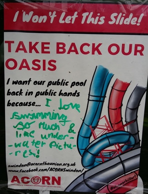 Acorn Swindon's Save the Oasis poster, includes water slides.  It reads, 'I won't let this slide!  Take back our Oasis.  I want our public pool back in public hands because..'  The poster has been completed to read, 'I like swimming so much and like underwater pictures'