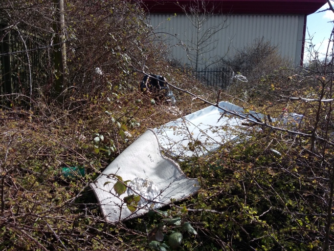 Dumped rubbish by a business