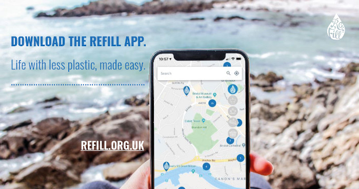Coastal location with a phone displaying an app in the foreground.  Reads, 'Download the Refill app.  Life with less plastic made easy'