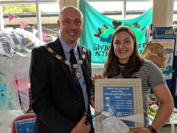 Refill Swindon launch.  The Refill co-ordinator stands with the Swindon mayor.