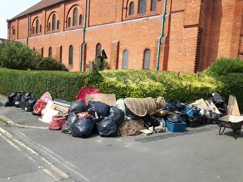 Ginormous pile of collected rubbish piled up for collection