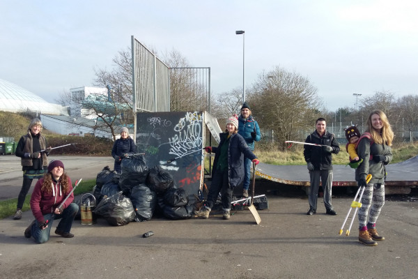 Oasis litter pickers pose for the camera alongside the rubbish collected