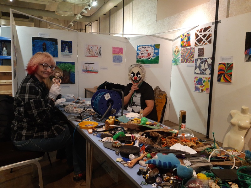 Junk and Disorderly group, one wearing a strange mask